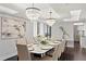 Formal dining room with modern chandelier, neutral color palette, and beautiful decor perfect for gatherings at 3301 Bayshore Blvd # 2207B, Tampa, FL 33629