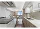 Modern kitchen featuring sleek white cabinets, stylish countertops, and a view overlooking the city at 3301 Bayshore Blvd # 2207B, Tampa, FL 33629