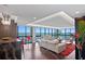 Living room with floor to ceiling windows overlooking the water and a sleek modern design at 3301 Bayshore Blvd # 2207B, Tampa, FL 33629