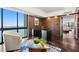 Well-appointed office space with dark wood floors and panoramic water views at 3301 Bayshore Blvd # 2207B, Tampa, FL 33629