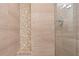 Modern shower features elegant tile work and glass door at 3301 Bayshore Blvd # 2207B, Tampa, FL 33629