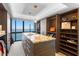 Luxurious walk-in closet with shelving, drawers, and water views at 3301 Bayshore Blvd # 2207B, Tampa, FL 33629