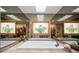 Bathroom features a large soaking tub, skylight, mirrored walls, and vanity with double sinks at 3427 Forest Bridge Cir, Brandon, FL 33511