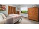 Bedroom with carpet, twin bed, shell decor, natural light, closet and small book case at 3427 Forest Bridge Cir, Brandon, FL 33511