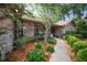Beautiful walkway is surrounded by lush landscaping leading to the front door at 3427 Forest Bridge Cir, Brandon, FL 33511