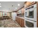 Modern kitchen with stainless steel appliances and a breakfast nook for casual dining at 3427 Forest Bridge Cir, Brandon, FL 33511