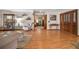 Spacious living room features gleaming hardwood floors and a clear view of the front entrance at 3427 Forest Bridge Cir, Brandon, FL 33511