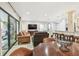 Open floor plan with a dining area, living room, and access to the kitchen, perfect for modern living at 36750 Us 19 N # 06111, Palm Harbor, FL 34684