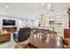 Bright and airy living space with a dining table, kitchen, and comfortable seating at 36750 Us 19 N # 06111, Palm Harbor, FL 34684