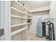 Well-organized walk-in pantry features adjustable shelving and ample storage space at 36750 Us 19 N # 06111, Palm Harbor, FL 34684