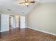 The spacious bedroom features wood-look floors and multiple closets at 3810 Hollister Pl, Brandon, FL 33511