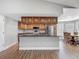 Kitchen with island, stainless appliances, granite countertops, tile backsplash and breakfast nook at 3810 Hollister Pl, Brandon, FL 33511