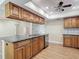 Kitchen island with granite countertops, stainless steel appliances and wood cabinets at 3810 Hollister Pl, Brandon, FL 33511