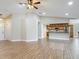Open concept living room view of the kitchen and a separate doorway on an angle at 3810 Hollister Pl, Brandon, FL 33511