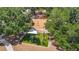 Aerial view of an outdoor public exercise area and playground surrounded by lush trees at 3810 Hollister Pl, Brandon, FL 33511
