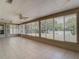Bright sunroom with tile flooring and lots of windows, offering a versatile space for relaxation and enjoyment of natural light at 3810 Hollister Pl, Brandon, FL 33511