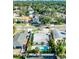 Residential neighborhood with pool, palm trees and tropical landscaping at 4104 W Watrous Ave, Tampa, FL 33629