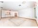 Large living room with tile accents and a window that offers natural light at 4104 W Watrous Ave, Tampa, FL 33629