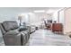 Comfortable living space features a skylight, cozy seating, and a functional desk area, perfect for relaxation or work at 4137 Northmeadow Cir, Tampa, FL 33618