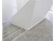 Carpeted staircase with handrail, provides safe and easy access to the upper or lower level of the home at 4137 Northmeadow Cir, Tampa, FL 33618