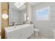 Modern bathroom with double sink vanity and stylish lighting fixtures at 4219 26Th N Ave, St Petersburg, FL 33713