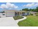 Well-kept single-story home boasting an attached garage, landscaped walkway, and charming front porch at 4219 26Th N Ave, St Petersburg, FL 33713
