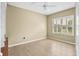 Bedroom featuring hardwood floors, a shuttered window, and neutral-colored walls at 4410 Natures Reach Ter, Parrish, FL 34219