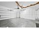 Spacious garage with room for two cars plus cabinets and storage areas at 4410 Natures Reach Ter, Parrish, FL 34219