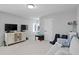 Neutral bonus room with media center, plush seating, and ample space at 4935 W Bay Way Pl, Tampa, FL 33629