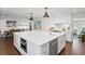 Spacious kitchen featuring a large center island, stainless steel appliances and an open layout at 4935 W Bay Way Pl, Tampa, FL 33629