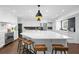 Bright kitchen with an expansive island, modern stainless steel appliances, and a cozy breakfast bar at 4935 W Bay Way Pl, Tampa, FL 33629