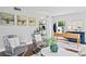 Bright living room with stylish furnishings, hardwood floors, and neutral decor at 4935 W Bay Way Pl, Tampa, FL 33629