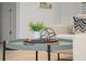 Stylishly decorated coffee table with modern decor, complemented by comfortable seating in the living area at 506 71St Ave # 7, St Pete Beach, FL 33706