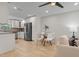 The kitchen and living room combine in this modern condo at 506 71St Ave # 7, St Pete Beach, FL 33706