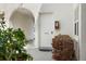 Exterior laundry room entrance with white door and fire extinguisher box at 506 71St Ave # 7, St Pete Beach, FL 33706