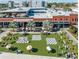 Aerial view highlighting the Tampa Armature Works, outdoor dining, and open green spaces at 5406 N Pershing Pl, Tampa, FL 33603