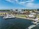 Wonderful aerial shot of waterfront area featuring a pier, a park, and buildings in the distance at 5406 N Pershing Pl, Tampa, FL 33603