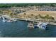 Gorgeous aerial view featuring docks, boats, and a waterfront restaurant with scenic views at 5406 N Pershing Pl, Tampa, FL 33603