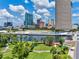 Breathtaking skyline aerial view of the buildings, riverfront, and park at 5406 N Pershing Pl, Tampa, FL 33603
