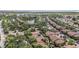 This aerial view shows the community's tennis courts at 5636 Baywater Dr # 5636, Tampa, FL 33615