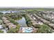 This aerial view shows the layout of the community and the pool at 5636 Baywater Dr # 5636, Tampa, FL 33615