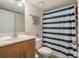 Bathroom with a single vanity, toilet and shower at 5636 Baywater Dr # 5636, Tampa, FL 33615