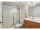 This bathroom is complete with a shower and vanity with storage at 5636 Baywater Dr # 5636, Tampa, FL 33615