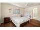 Bedroom featuring wood floors, natural light, and a neutral palette at 5636 Baywater Dr # 5636, Tampa, FL 33615