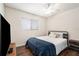 This cozy bedroom is complete with a ceiling fan, natural light, and a tv at 5636 Baywater Dr # 5636, Tampa, FL 33615