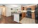 Bright kitchen features updated cabinets, appliances, and a tiled floor at 5636 Baywater Dr # 5636, Tampa, FL 33615