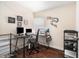 Functional office space with dark wood floors and bright natural light at 5636 Baywater Dr # 5636, Tampa, FL 33615