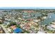 Stunning aerial view of a waterfront community with gorgeous landscaping and a desirable neighborhood layout at 6129 Leeland S St, St Petersburg, FL 33715