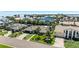 Experience luxurious living in this coastal home boasting mature landscaping, a paver driveway, and stunning curb appeal at 6129 Leeland S St, St Petersburg, FL 33715