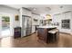 Well-appointed kitchen with a center island, stainless steel appliances, and access to the pool area at 6129 Leeland S St, St Petersburg, FL 33715